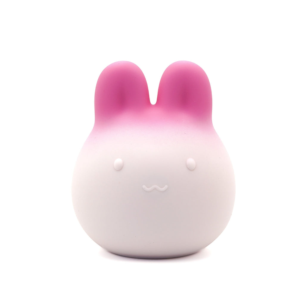 Get Closa pink gradient bunny-shaped silicone vibrator with a cute face and soft squeezable body