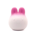 Get Closa pink gradient bunny-shaped silicone vibrator with a cute face and soft squeezable body